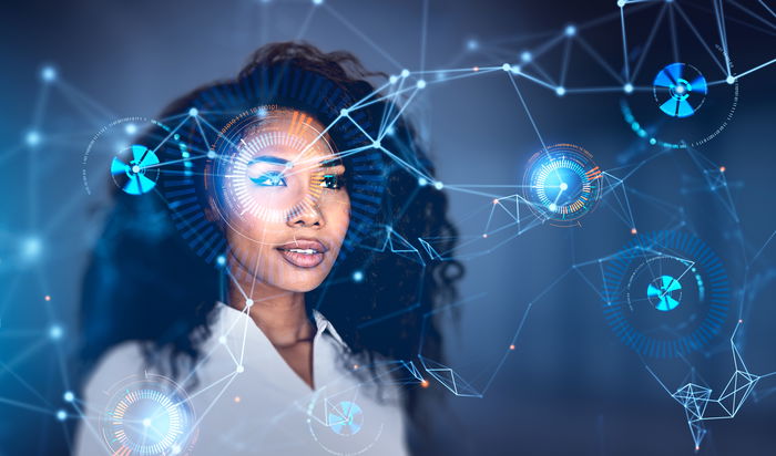 A woman looks forward with digital graphic overlays of interconnected networks, data points, and circular interface elements in a futuristic technology concept.